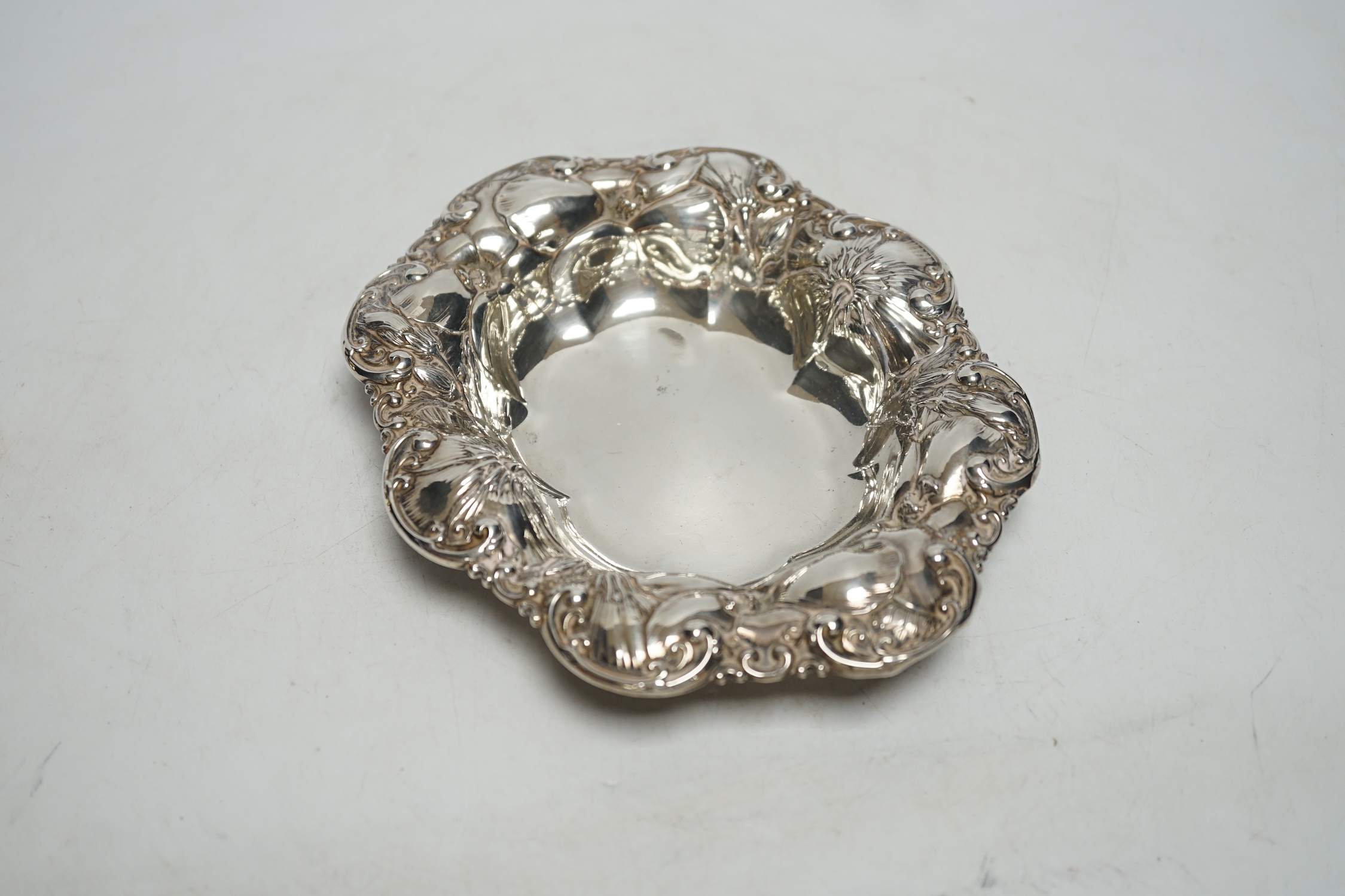 A Dutch white metal soup ladle, 29.5cm and a sterling small dish, 9.3oz.